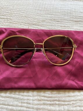 Gold tone metal frame Ferragamo sunglasses